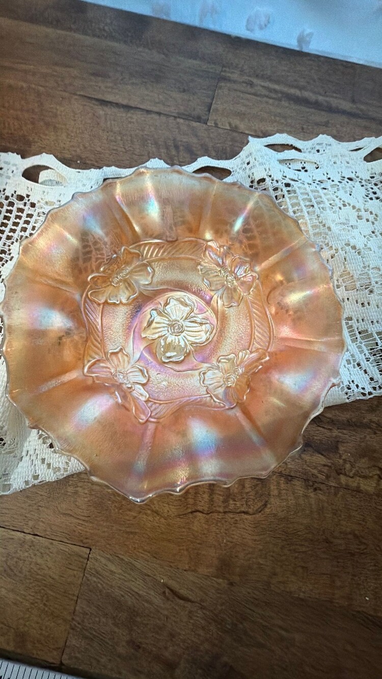 #73 Early 20th-century Dugan marigold carnival glass apple blossom bowl.